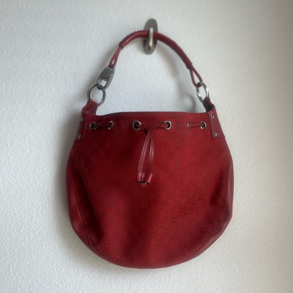 Vintage Gucci monogram Drawstring Hobo in red.